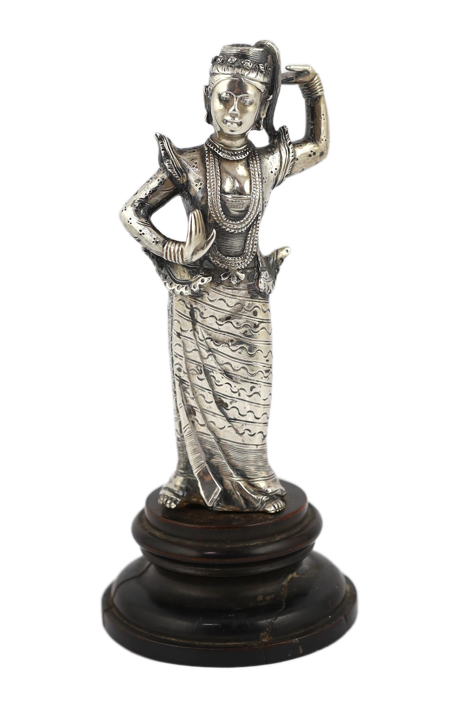 A Burmese cast silver model of a dancer, late 19th century